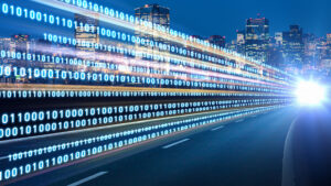 Digital signals flying over highway. Digital transformation. Internet of Things.